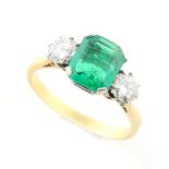 An 18ct yellow gold & platinum certificated Colombian emerald & diamond three stone ring, the