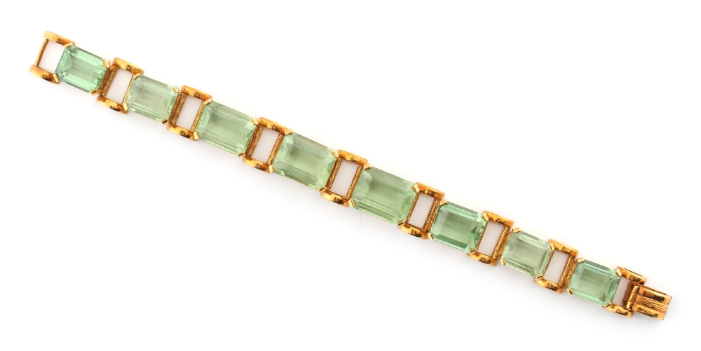 Property of a deceased estate - a 1970's hallmarked 18ct yellow gold green paste link bracelet, by