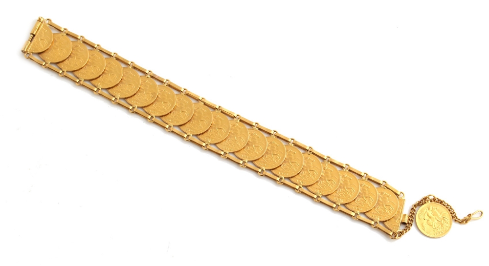 Property of a lady - gold coins - an unmarked gold (tests 18ct) bracelet set with 21 gold half - Image 2 of 2