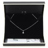 Property of a lady - an 18ct white gold diamond single stone pendant on 18ct white gold chain, the