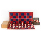 Property of a lady - a late 19th / early 20th century red stained & natural bone chess set,