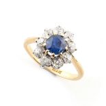 An 18ct yellow gold certificated unheated sapphire & diamond oval cluster ring, the cushion cut