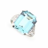 An Art Deco style aquamarine ring, the large octagonal cut aquamarine weighing approximately 8.89