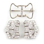 A good pair of Art Deco platinum diamond clips, joining on a diamond set frame to be worn as a
