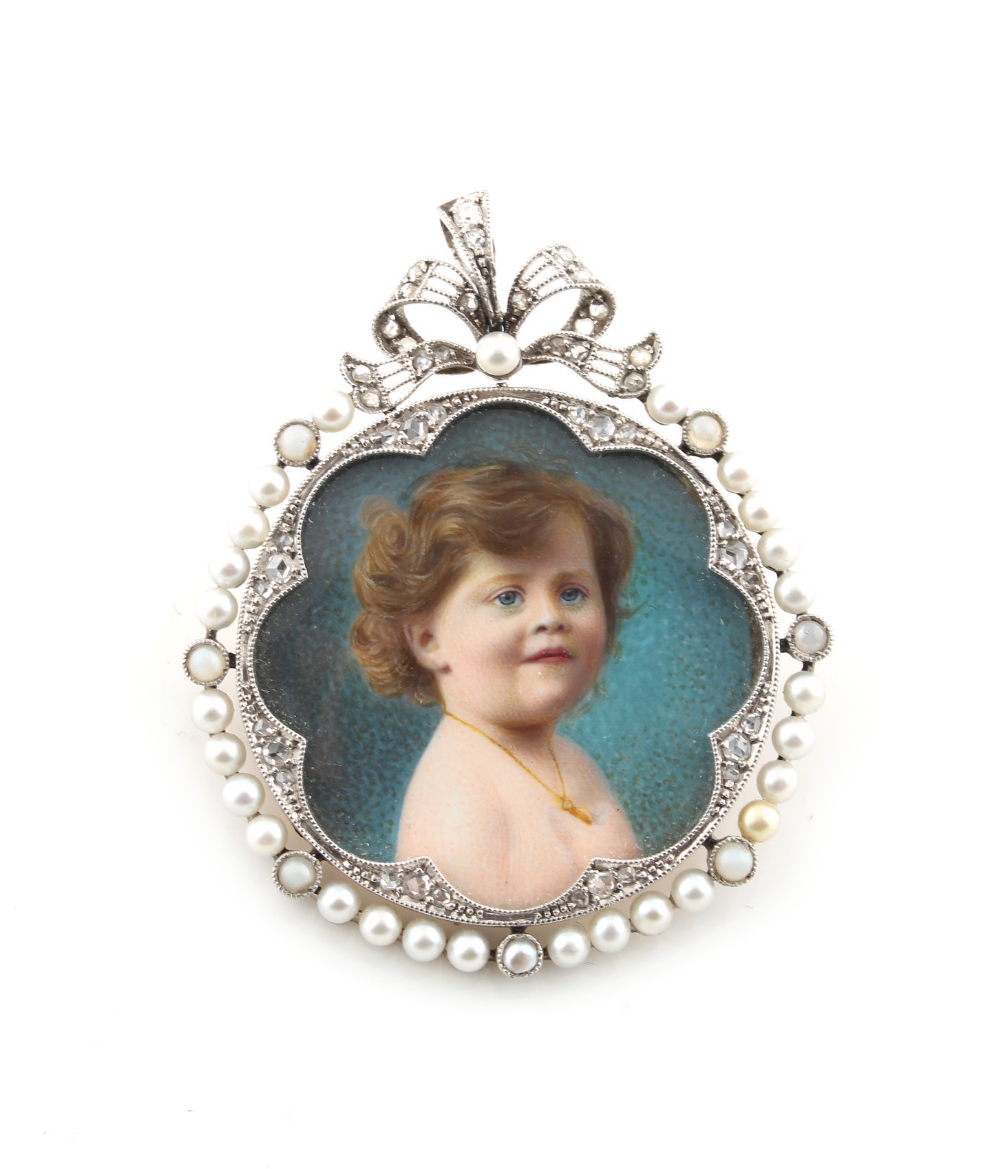 An early 20th century Belle Epoque diamond & pearl circular framed portrait miniature depicting a