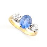 An 18ct yellow gold certificated unheated Ceylon sapphire & diamond three stone ring, the oval cut