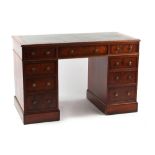 Property of a gentleman - a reproduction mahogany twin-pedestal desk, with green leather inset top