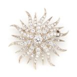 A good diamond flowerhead or sunburst brooch, the round brilliant cut diamonds weighing an estimated