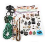 Property of a lady - a bag containing assorted costume jewellery, including tiger's eye, malachite &