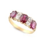 An 18ct yellow gold certificated unheated Thai ruby & diamond ring, the three oval & cushion cut