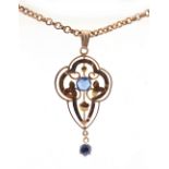 Property of a lady - an Edwardian Art Nouveau 9ct yellow gold pendant set with two round cut