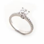 Property of a lady - a platinum diamond solitaire ring, the princess cut certificated diamond
