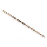 Property of a lady - a 14ct yellow gold citrine or smoky quartz & diamond bracelet, 7.1ins. (18cms.)