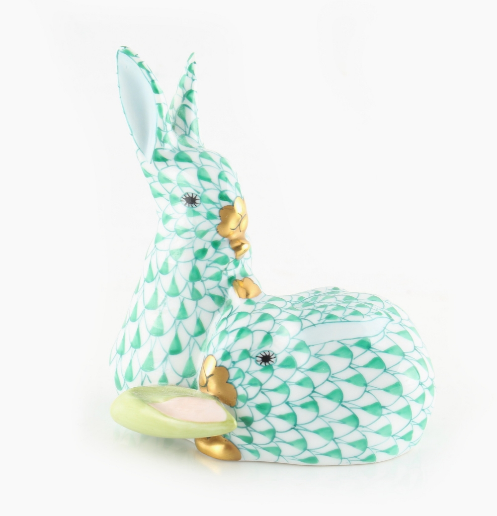 Property of a gentleman - a Herend fishnet model of two rabbits, 3.4ins. (8.6cms.) high.