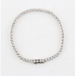 A diamond collet link bracelet, the fifty-six round brilliant cut diamonds weighing a total of