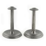 Property of a lady - a pair of Tudric pewter candlesticks, model number 0983, with drip pans, 7.
