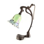 Property of a deceased estate - an Art Nouveau style copper table lamp with variegated glass petal