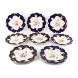Property of a gentleman - a set of eight 19th century floral painted porcelain dessert plates, red