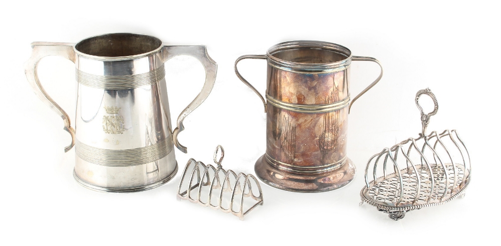 Property of a lady - two silver plated two-handled bottle coasters, the taller (19cms.) high;