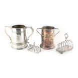 Property of a lady - two silver plated two-handled bottle coasters, the taller (19cms.) high;
