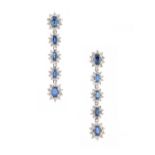 A very attractive pair of sapphire & diamond pendant five section oval cluster earrings, with post &