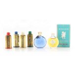 A private collection of perfume bottles - COTY - Emeraude, L'Origan, Paris and L'Aimant - a set of