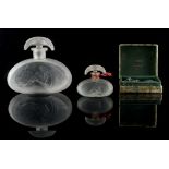 A private collection of perfume bottles - JORGENS - a frosted glass scent bottle with seated