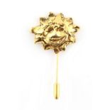 Property of a lady - Hermes - a Hermes Paris Bijouterie Fantaisie gold tone metal sun mask pin,