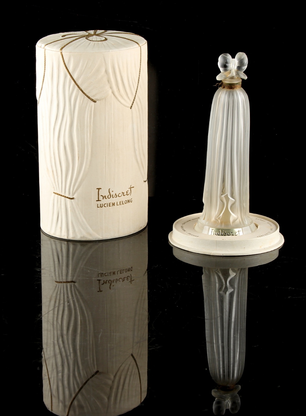 A private collection of perfume bottles - LUCIEN LELONG - 'Indiscret', empty frosted glass perfume