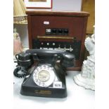 A c.1950's Telephone Exchange Box, with ring and extension switches; together with a black