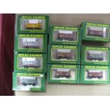 Ten Items Replica Railways OO Gauge Dapol Rolling Stock, boxed, three tankers, seven sixteen ton