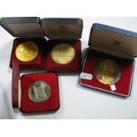 Four Cased Commemorative Medallions, including Royal Mint medal struck in celebration of the 25th