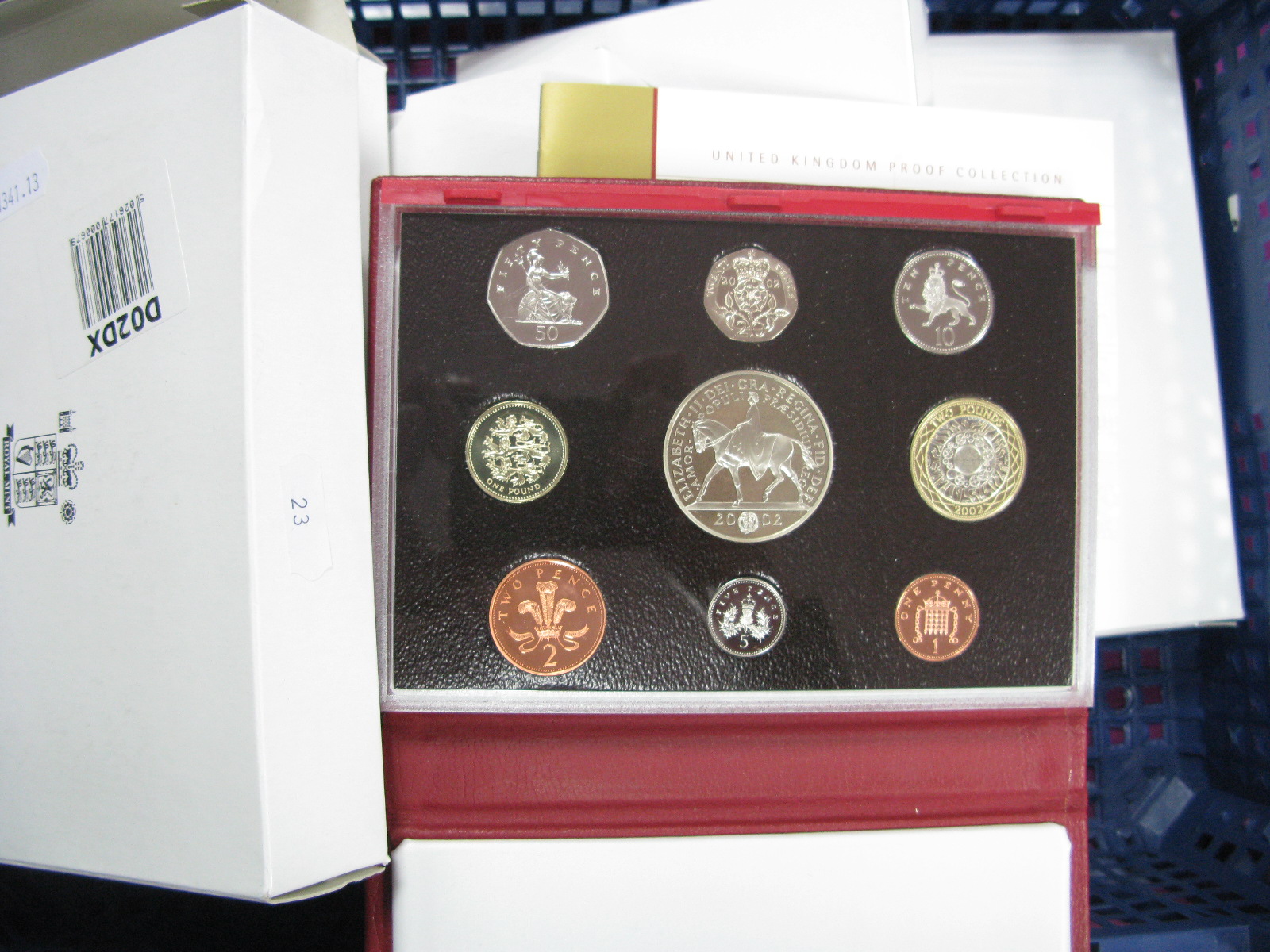 Five Royal Mint United Kingdom Proof Coin Sets, 2002 (2), 2003, 2004, 2005, presented in Royal