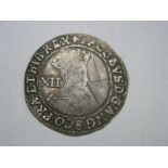 James I Shilling, T Scratch to side of bust, but good detail toned and old cabinet condition.
