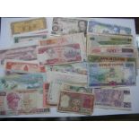 In Excess of Fifty Circulated Overseas Banknotes, including Reserve Bank of India two rupees,