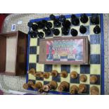 An Early XX Century Wooden Chess Set on Board (unnamed); plus a further boxwood set by Sondica. (2)