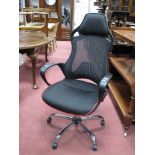 A Black Adjustable Office Chair.