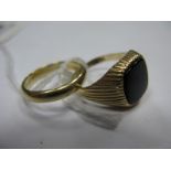 A Gent's 9ct Gold Ring, with inset cushion shape panel, between reeded shoulders; together with a