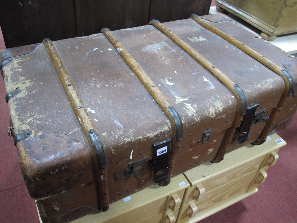 A c.1930's Wooden Bound Travel Trunk, with leather carry handles, initialled "G.C.W.".