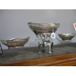 White Metal Table Centrepiece, with pierced central basket, two others smaller on outstretched