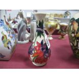 A Moorcroft Pottery Vase, painted with the Ruby Red pattern designed by Emma Bossons, impressed