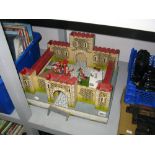 A Mid XX Century Wooden Fort, with plastic figures by Britains and others.