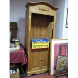 Freestanding Pine Bookcase, with upper cupboard doors, 88cm wide; a single bed frame. (2)