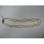 A Two Row Graduated Pearl Bead Necklace, to inset clasp stamped "Silver".
