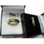 A 9ct Gold Wedding Band, with inset detail; together with another 9ct gold stone set ring. (2)