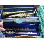 A Boosey & Hawkes Brass Trumpet, plus Chinese lark flute (both cased).