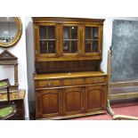 Oak Dresser, in the Titchmarsh & Goodwin manner with stepped pediment, three glazed doors over three