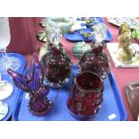 A Pair of Aseda Glasbruk Swedish Purple Glass decanters with clear glass stoppers, 23cm high, a