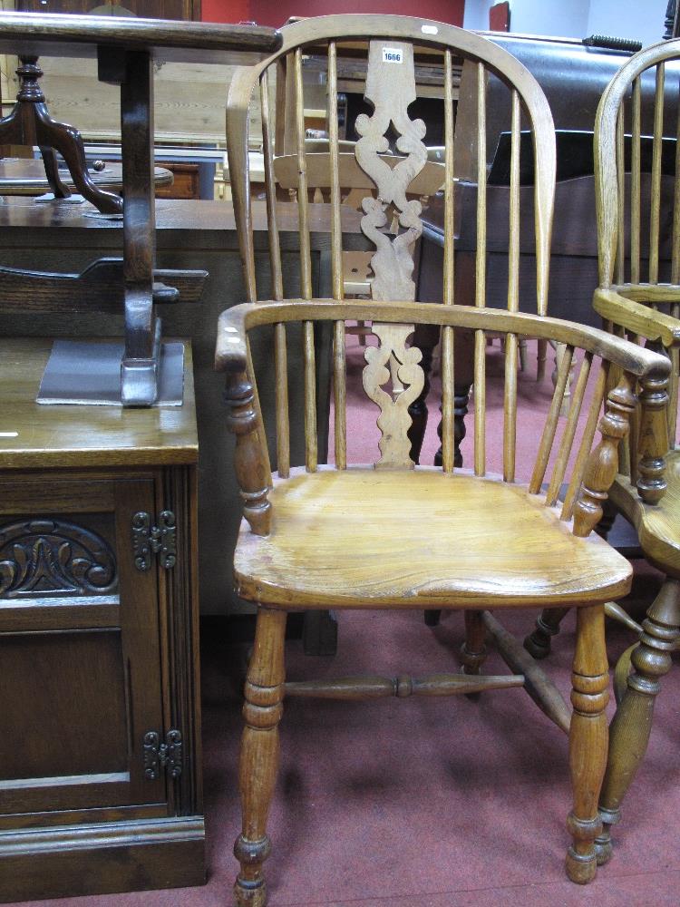 A XIX Century Ash and Elm Windsor Armchair, with pierced centre splat, spindle back and 'H'