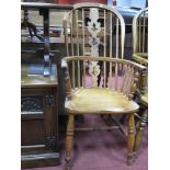 A XIX Century Ash and Elm Windsor Armchair, with pierced centre splat, spindle back and 'H'
